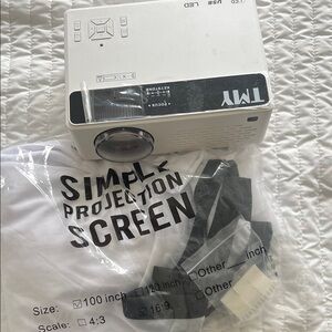 Portable Mini Projector with Screen - used twice in great condition